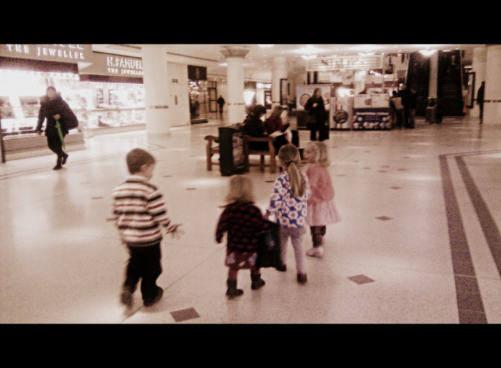 four children in The Glades Shopping Centre