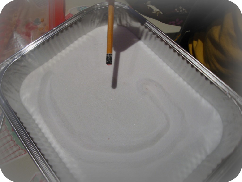 my letter writing letters in the sand to encourage writing skills