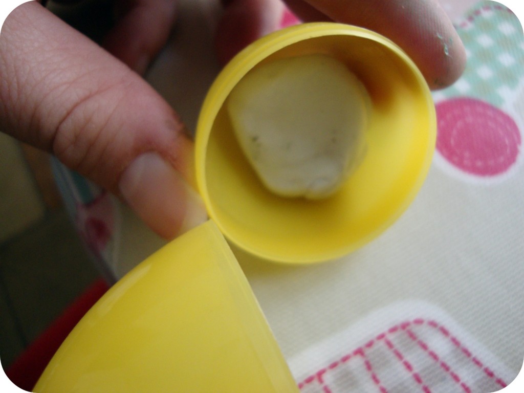 put blu-tack into the egg